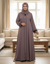 Elegant Mauve Textured Abaya | Sleek Black Piping & Cuff Details | Tehnoor
