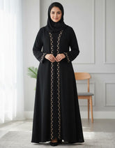 Tehnoor Noir Leaf Embroidered Abaya Subtle elegance woven in beige threads