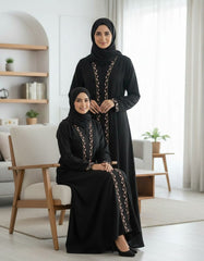 Tehnoor Noir Petal Embroidered Abaya Elegance redefined with soft pink artistry