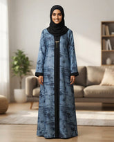 Elegant Blue Abstract Print A-Line Abaya with Black Trim & Bow Brooch | Tehnoor