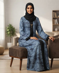 Elegant Blue Abstract Print A-Line Abaya with Black Trim & Bow Brooch | Tehnoor